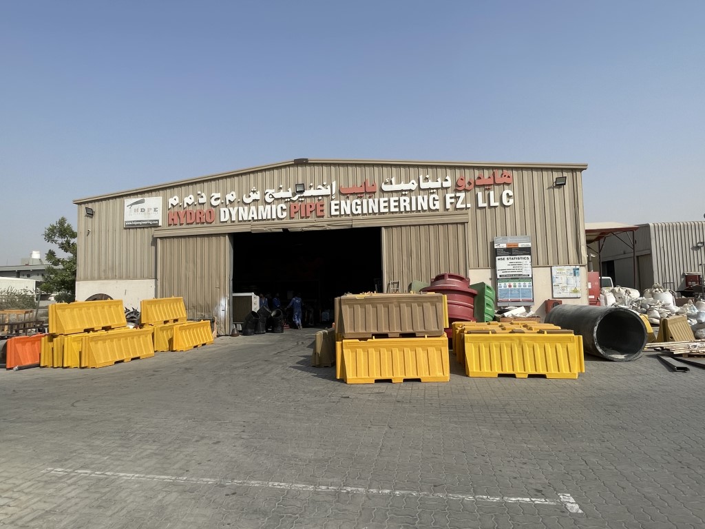 ozplast road barriers for safety infront of hdpe factory gate_